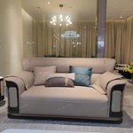 Cream Leather Sofa with Lace-Up Diamond-Stitched Sides and Dark Glossy Frame